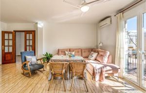 a living room with a couch and a table at Stunning Air Conditioned House in Cijuela