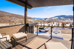 a balcony with a view of a parking lot at Sunlight Retreat in Steamboat Springs