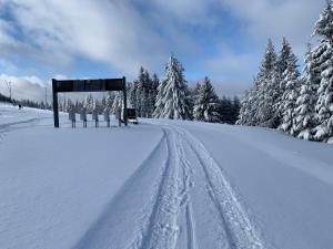 Apartmán Plešivec u sjezdovky en invierno