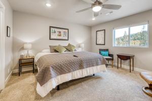 a bedroom with a bed and a window at Crooked River #22 in Brian Head