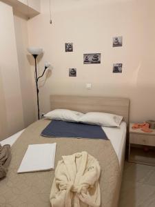 Postel nebo postele na pokoji v ubytování G&M Luxury Studios