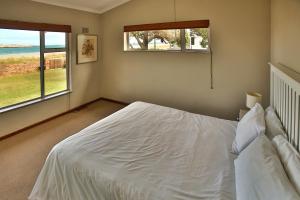 Postel nebo postele na pokoji v ubytování Holiday Home Seemansrus