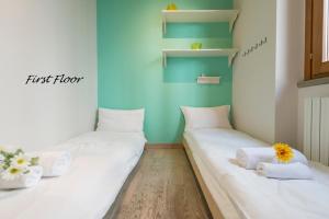 Posteľ alebo postele v izbe v ubytovaní Heart Centre Milan Navigli 3 Levels Apartment