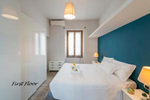 Posteľ alebo postele v izbe v ubytovaní Heart Centre Milan Navigli 3 Levels Apartment