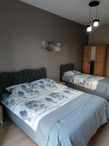 Postel nebo postele na pokoji v ubytování Nur Sena's House