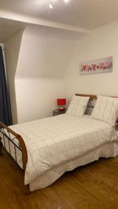Postel nebo postele na pokoji v ubytování Charmant appartement dans l’Orne !