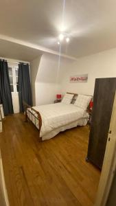 Postel nebo postele na pokoji v ubytování Charmant appartement dans l’Orne !