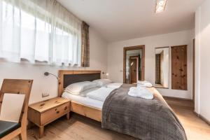 Posteľ alebo postele v izbe v ubytovaní Le Table A