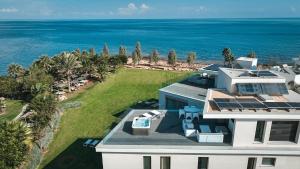 an aerial view of a house with solar panels on it at Mythical Villas Zeus and Venus in Protaras