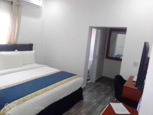 Katil atau katil-katil dalam bilik di Credence Resorts Aco
