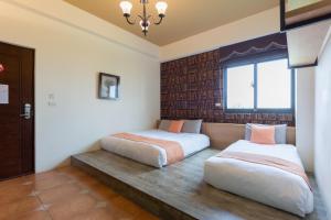 Postel nebo postele na pokoji v ubytování 時光輕旅 Time INN