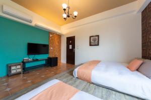 Postel nebo postele na pokoji v ubytování 時光輕旅 Time INN
