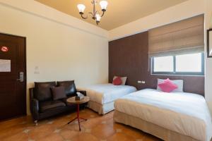 Postel nebo postele na pokoji v ubytování 時光輕旅 Time INN