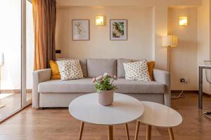 A seating area at 797 Holiday Rentals- Atico en Arroyo de la miel con hermosas vistas