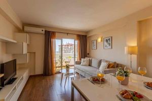 A seating area at 797 Holiday Rentals- Atico en Arroyo de la miel con hermosas vistas