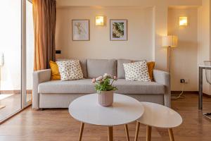 A seating area at 797 Holiday Rentals- Atico en Arroyo de la miel con hermosas vistas