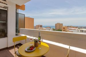 A balcony or terrace at 797 Holiday Rentals- Atico en Arroyo de la miel con hermosas vistas