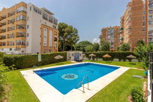 The swimming pool at or close to 797 Holiday Rentals- Atico en Arroyo de la miel con hermosas vistas