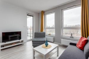 TV a/nebo společenská místnost v ubytování Chill Apartments Ursus