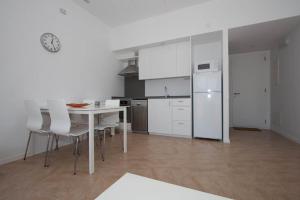Kuchyňa alebo kuchynka v ubytovaní Aparthotel l'Heretat