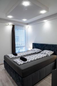 Posteľ alebo postele v izbe v ubytovaní Dream Apartman 3 with Free Parking