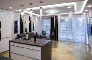 A television and/or entertainment centre at Dream Apartman 3 with Free Parking