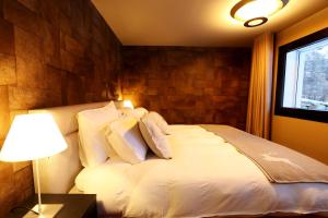 Letto o letti in una camera di Hollywood 1 - A luxury, comfortable and spacious apartment located directly on the slopes!