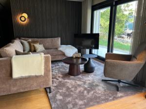 Area soggiorno di Hollywood 1 - A luxury, comfortable and spacious apartment located directly on the slopes!