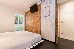 Ένα ή περισσότερα κρεβάτια σε δωμάτιο στο Lujo en Las 4 Torres! Business Area