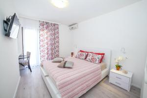 Cama ou camas em um quarto em Villa Mona 2