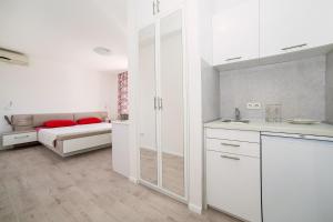 Cama ou camas em um quarto em Villa Mona 2
