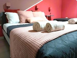 Posteľ alebo postele v izbe v ubytovaní B&B ONE
