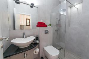 Um banheiro em Villa Mona 2