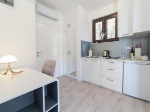 A cozinha ou cozinha compacta de Villa Mona 2