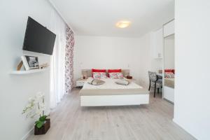 Cama ou camas em um quarto em Villa Mona 2