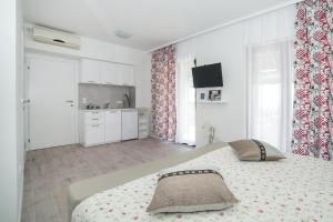 Cama ou camas em um quarto em Villa Mona 2