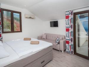 Cama ou camas em um quarto em Villa Mona 2