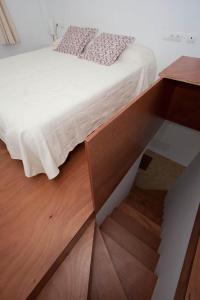 Posteľ alebo postele v izbe v ubytovaní Aparthotel l'Heretat