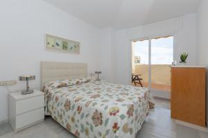 A bed or beds in a room at Atico Lujoso