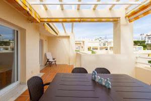 A balcony or terrace at Atico Lujoso