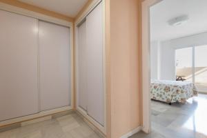 A bed or beds in a room at Atico Lujoso