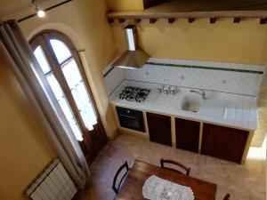an overhead view of a kitchen with a sink at Podere Sant'Antonio in Buonconvento