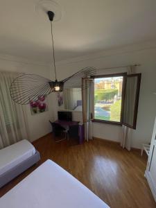 Postel nebo postele na pokoji v ubytování Sette Note Guest House