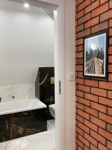 Kúpeľňa v ubytovaní Apartament BB I na Kiepury + 17 fotografií