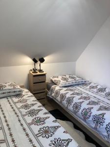 Posteľ alebo postele v izbe v ubytovaní Apartament BB I na Kiepury
