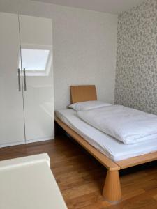 Postel nebo postele na pokoji v ubytování Ferienwohnung Rosengarten