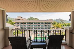 a view of a hotel from the balcony of a resort at Lacol Khao Yai - A Chatrium Collection in Mu Si