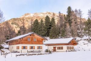 Chalet Sennhütte Obertauern mit Zirbensauna und neuem XL Bad зимой