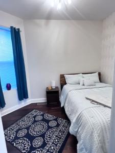 a bedroom with two beds next to a window at Simplified Living Space in Chicago