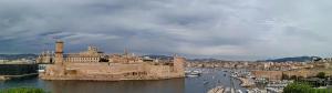 a view of a city and a river with boats at studio vue imprenable sur marseille in Marseille
